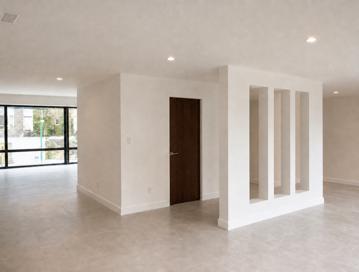 Ambiente interior completamente terminado con acabados en drywall